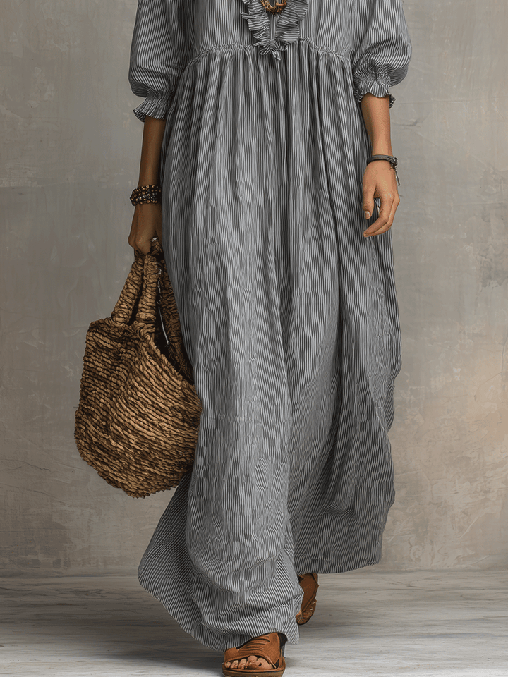 Ropa larga bohemia fluida con acabados de volantes